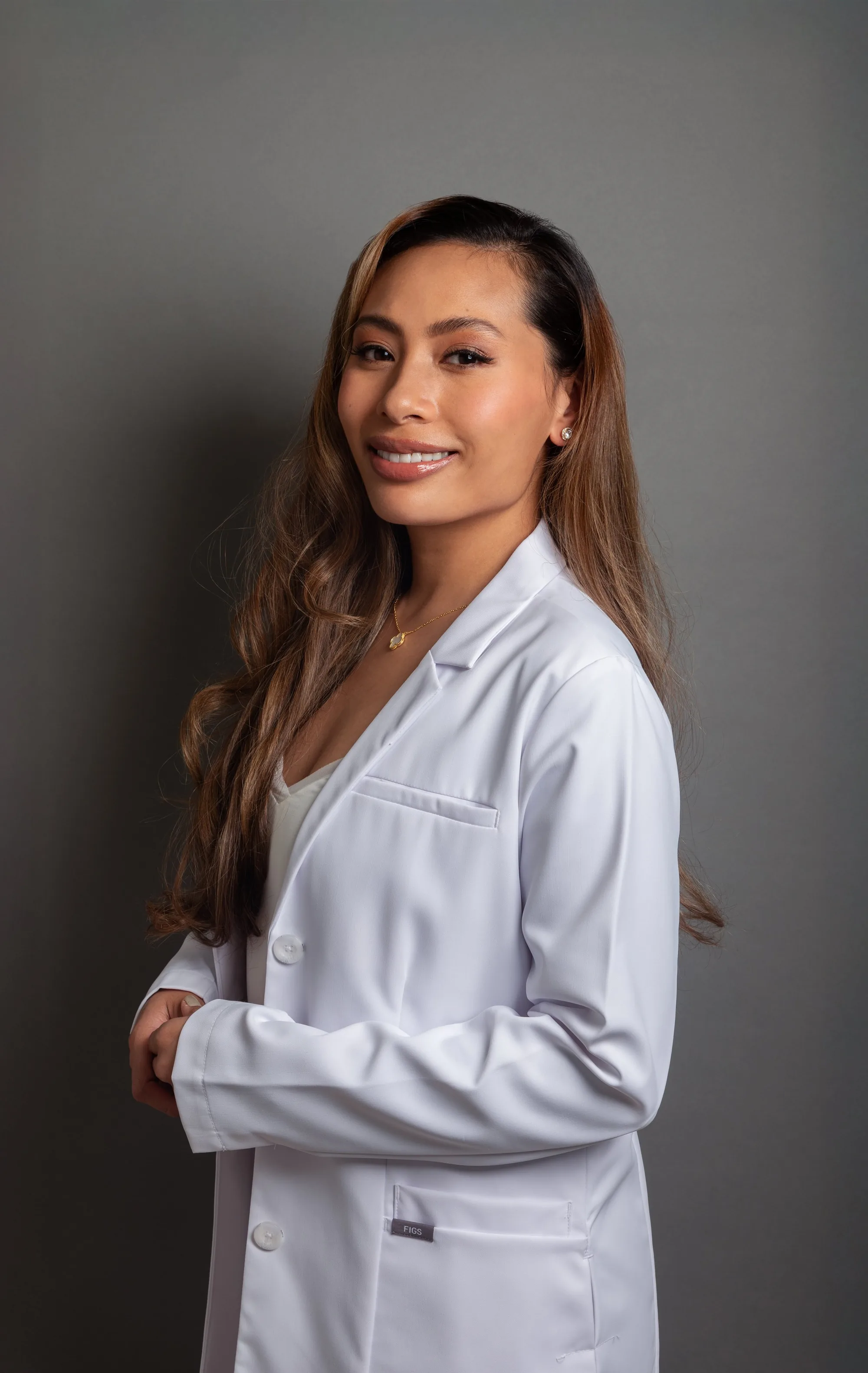 Janeeh Miranda, MSN, FNP-C, nurse practitioner and owner of Benicia Medical Aesthetics, in a white coat